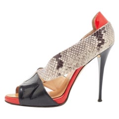 Giuseppe Zanotti Bombas D'orsay con puntera abierta de piel de serpiente y charol Talla 40.5