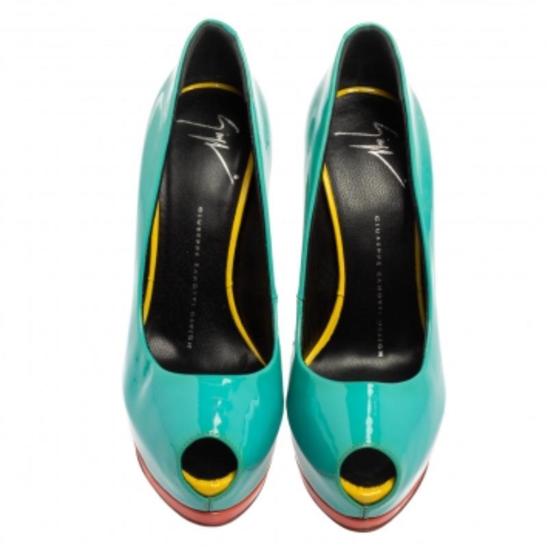 This galvanizing pair of pumps characterized by its sophistication and curves are offered by Giuseppe Zanotti. The exterior is crafted with patent leather and they come with peep toes, platforms and leather-lined insoles. These lovely pumps are