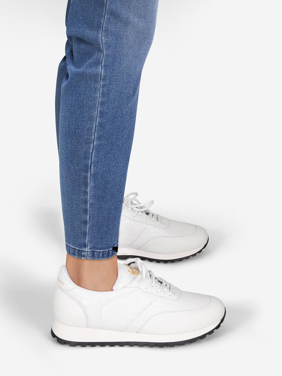 CONDITION is New with tags on this brand new Giuseppe Zanotti designer item. This item comes with original packaging.
 
 
 
 Details
 
 
 I160018
 
 Model: Jimi 15
 
 White
 
 Leather
 
 Trainers 
 
 Crocodile embossed
 
 Logo hardware
 
 Lace