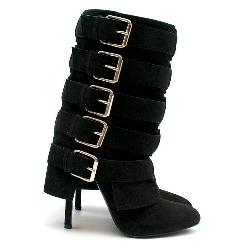 Giuseppe Zanotti boots crafted in black suede leather featuring 5 buckled straps and a split cuff.

- Stiletto heel
- Cuff extends the length of the shaft
- Buckles in metallic silver
- Leather sole
- Made in Italy

Please note, these items are