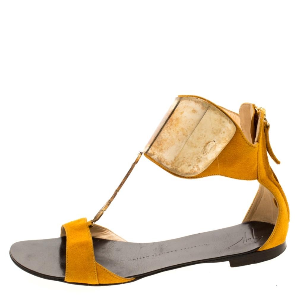 You'll truly be in love with these sandals from Giuseppe Zanotti as they are stylish and modern. They've been designed using suede with gold-tone metal ankle cuffs and zippers on the counters. The sandals are just perfect to nail a chic casual