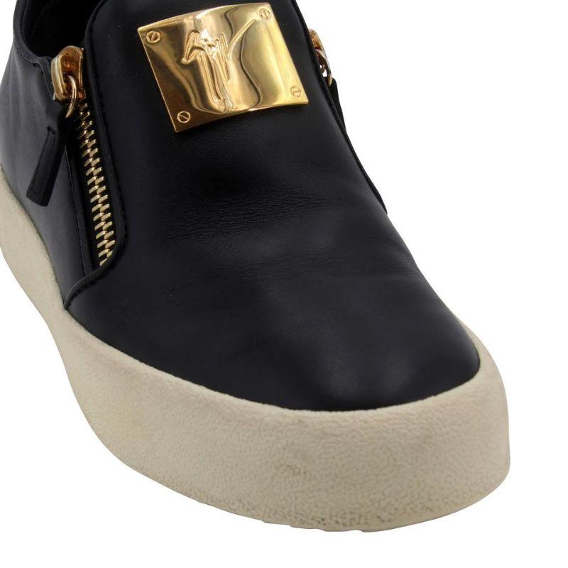 Giuseppe Zanotti Zip Slip-on 38 Leather Sneakers GZ-0208N-0016

These Giuseppe Zanotti Zip Slip-On Sneakers are a must! Featuring leather uppers, and comfortable rubber soles. These sneakers are just the thing you need to make any outfit pop. The