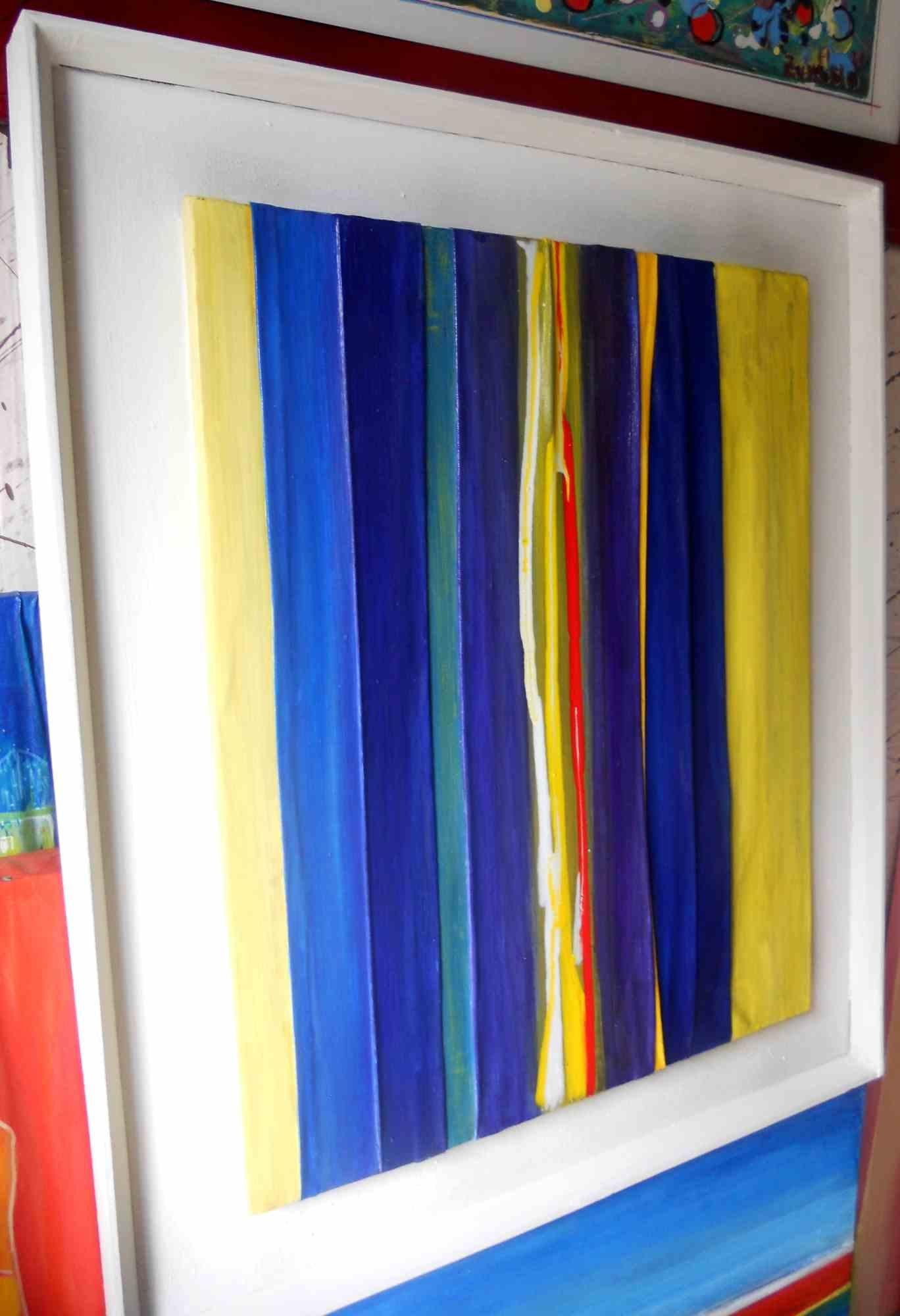 Blue and Yellow Composition is one of the best works of the artist Giuseppe Zumbolo. It is made on canvas painted in acrilyc in 2021.

The canvas is folded vertically by hand to obtain precise backgrounds and three-dimensionality. It is a work full