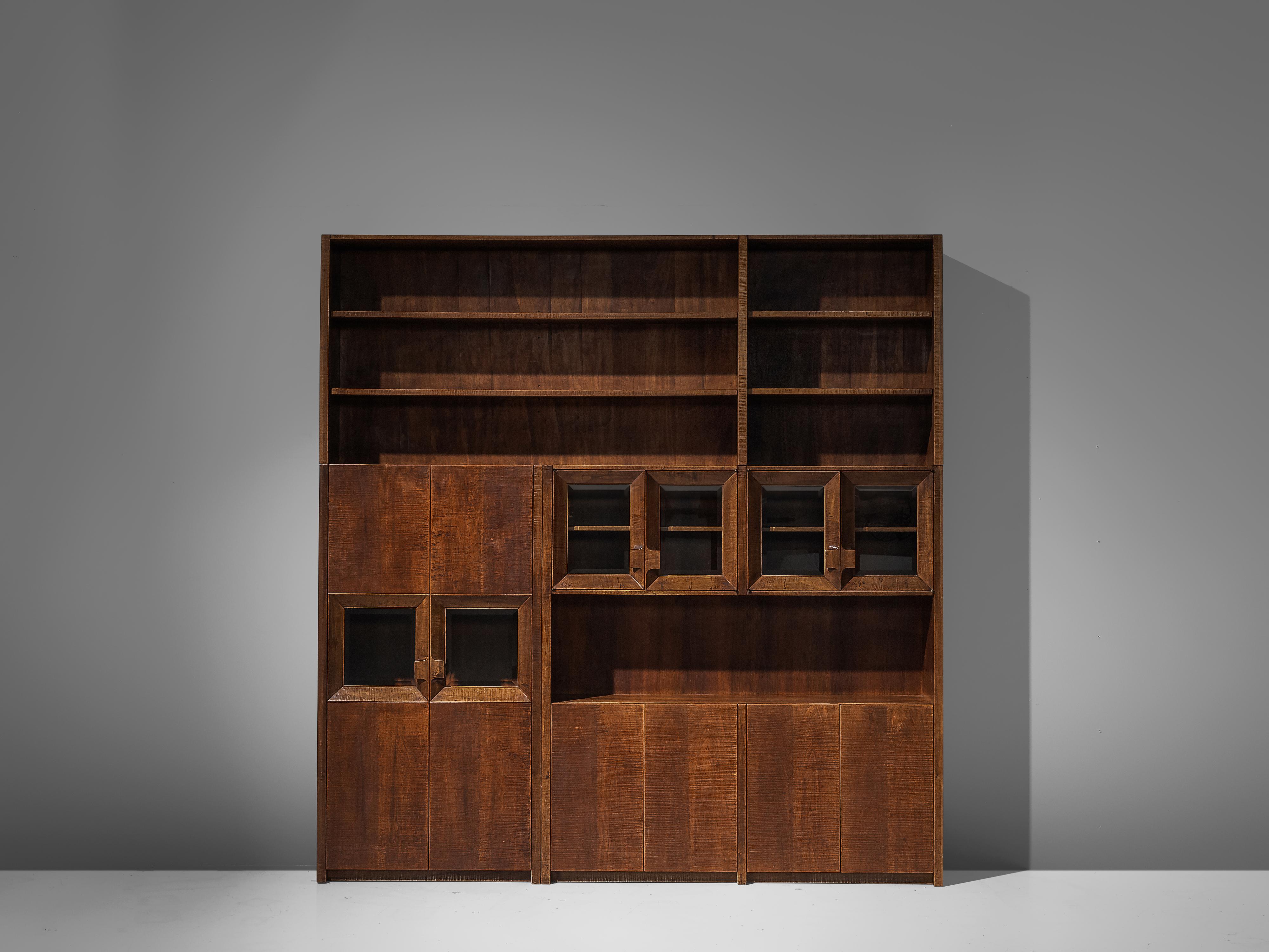 Giusseppe Rivadossi, bookcase, oak, Italy, circa 1970

An exceptional cabinet by the Italian sculptor and designer Giuseppe Rivadossi, featuring a high level of craftsmanship in woodwork. The wood is completely carved with gouge cut, which gives