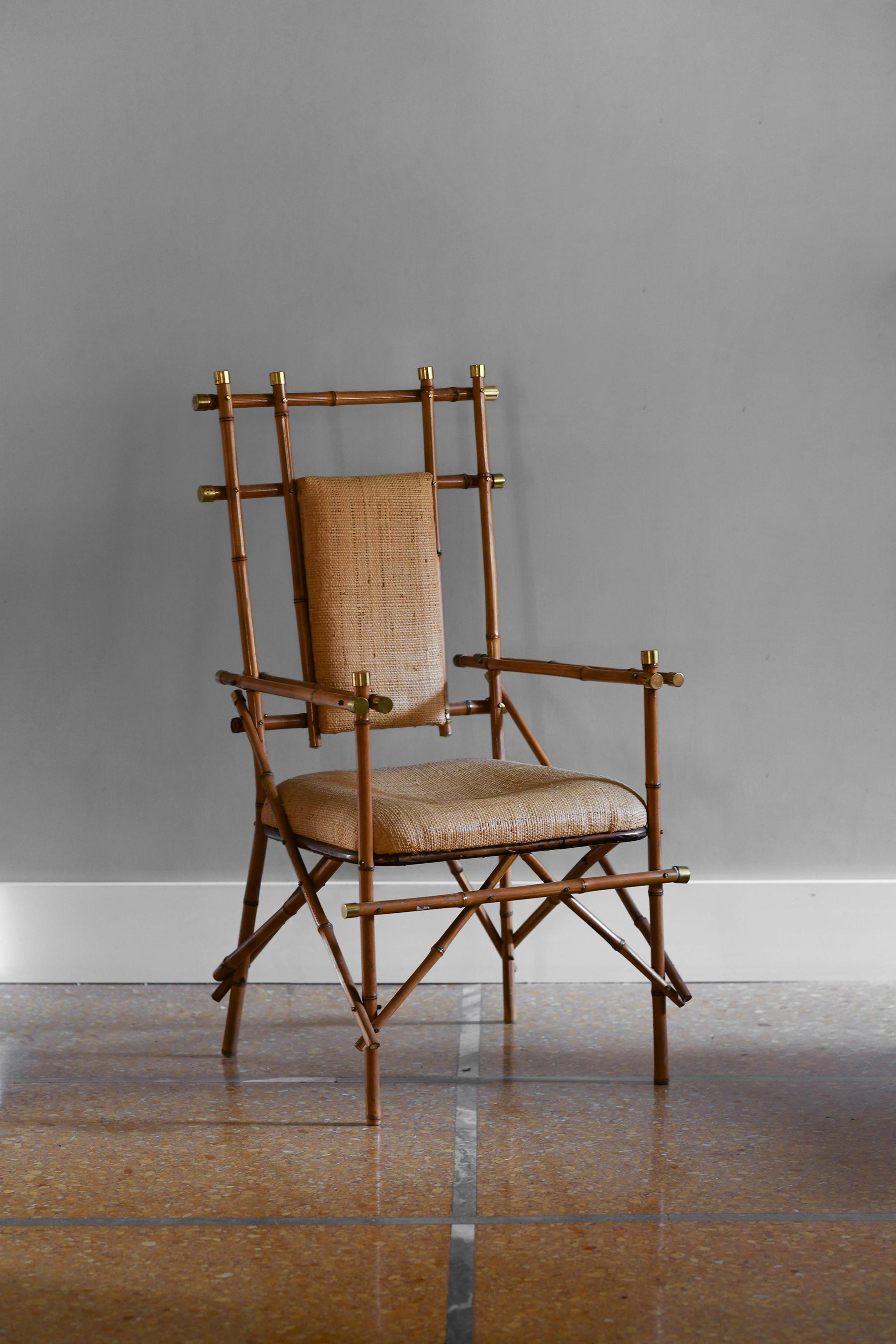 Rattan armchair with brass details and rattan fabric cushions by Giusto Puri Purini, Italy 1970.

From 1972 to 1977 Giusto Puri Purini worked within the company of the Italian design brand 