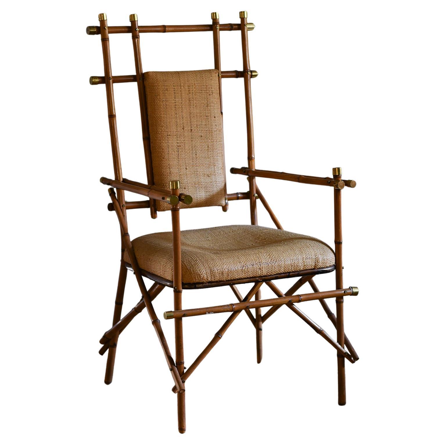 Giusto Puri Purini rattan armchair with brass details and rattan fabric cushions For Sale