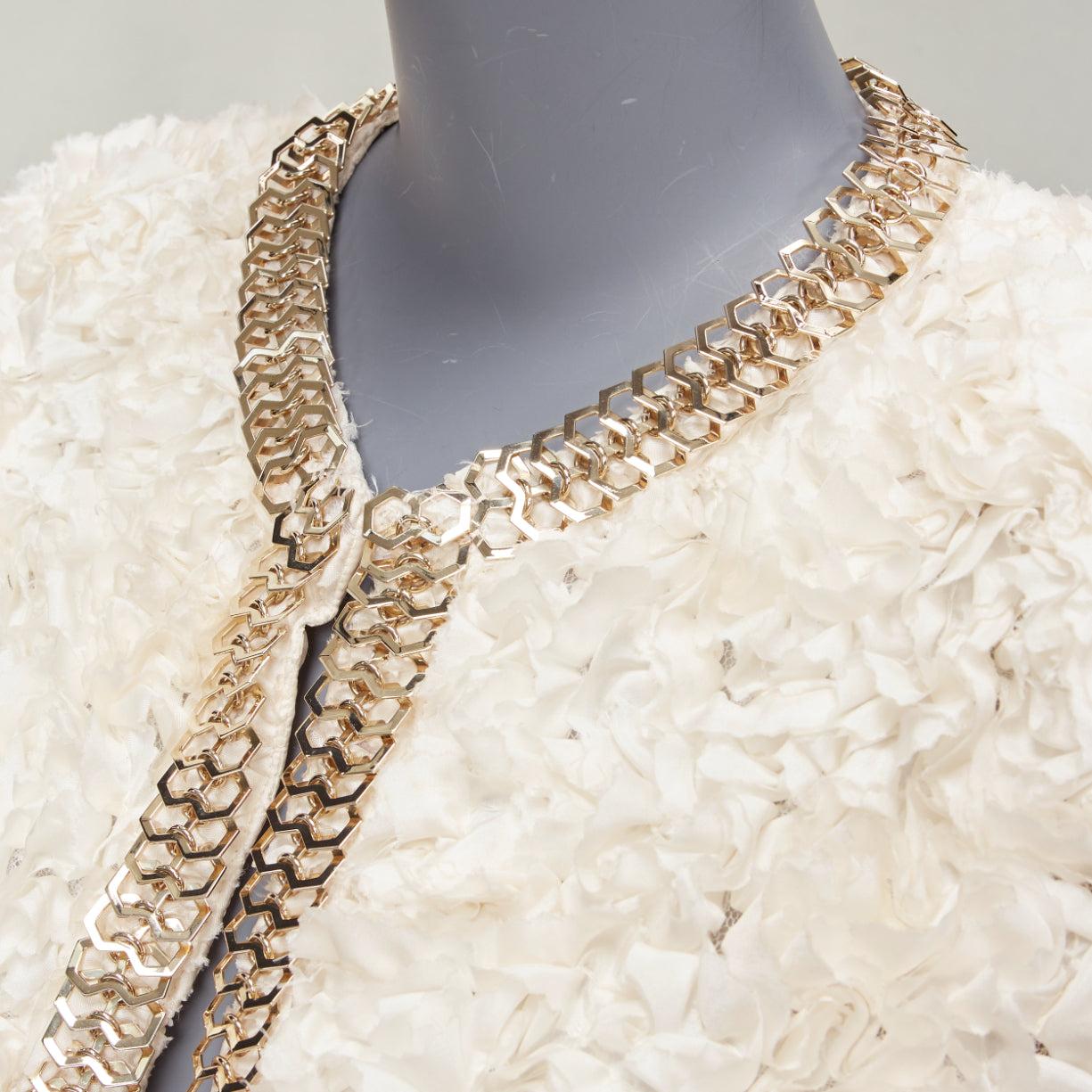 GIVENCHY 100% silk cream applique ruffle gold brass chain cropped jacket S
Reference: NKLL/A00178
Brand: Givenchy
Designer: Riccardo Tisci
Material: Silk, Brass
Color: Cream, Gold
Pattern: Solid
Closure: Hook & Eye
Lining: Cream Silk
Made in: