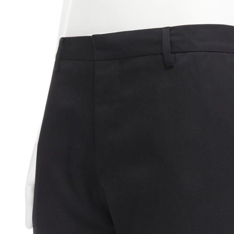 GIVENCHY 100% lana pantalón recto negro EU48 M
Referencia: VACN/A00029
Marca: Givenchy
Diseñador: Riccardo Tisci
Model No: Negro
Material: 100% Lana
Color: Negro
Patrón: Sólido
Cierre: Bragueta con cremallera
Forro:  Viscosa
Detalles adicionales: