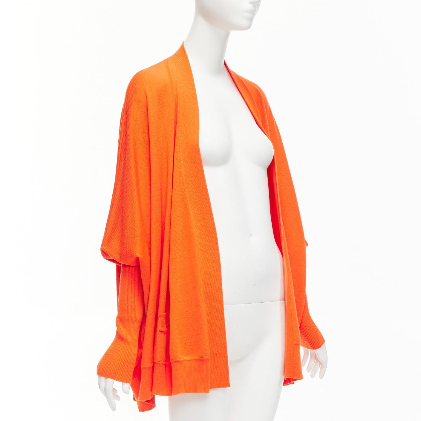 GIVENCHY 100% wool orange draped batwing ribbed sleeves relaxed cardigan M
Reference: NKLL/A00161
Brand: Givenchy
Designer: Riccardo Tisci
Material: Wool
Color: Orange
Pattern: Solid
Extra Details: Signature cross seam at back.
Made in:
