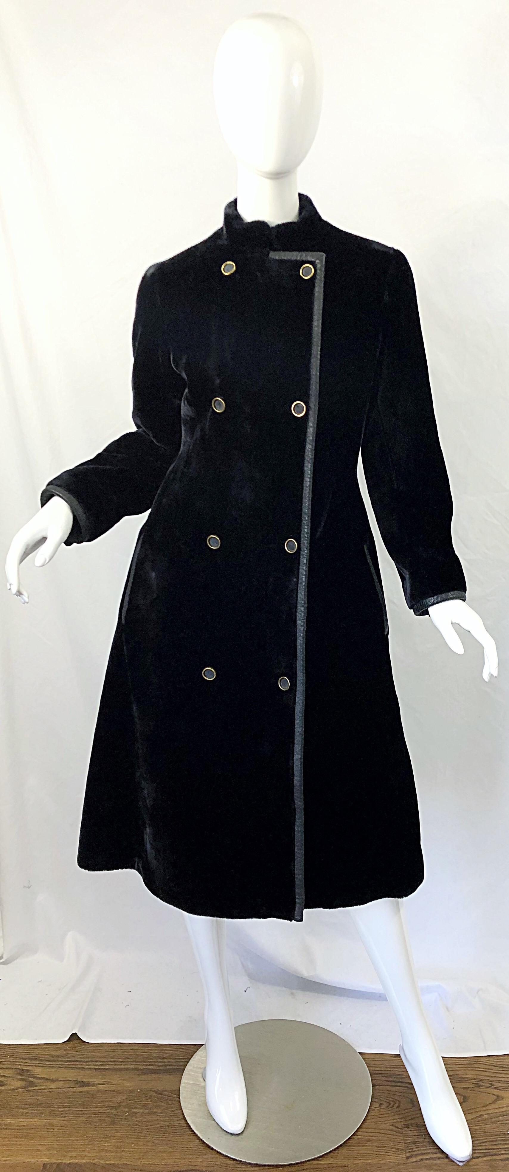 Chic 1960s GIVENCHY borg plush faux fur black double breasted women's swing jacket coat ! Features black and gold buttons up the front. Black leather like piping. POCKETs at each side of the hips. Fully lined. The perfect winter coat that can easily