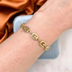 Givenchy 1970er Vergoldetes 'G' Vintage Armband