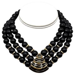 Givenchy Collar Art Decó de 3 vueltas de cuentas de resina negra y oro de los años 80