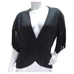 Chaleco negro de flecos Givenchy años 80