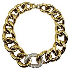 Collar de Givenchy de los años 80 con eslabones de tamaño variable, en oro y con pavé de strass