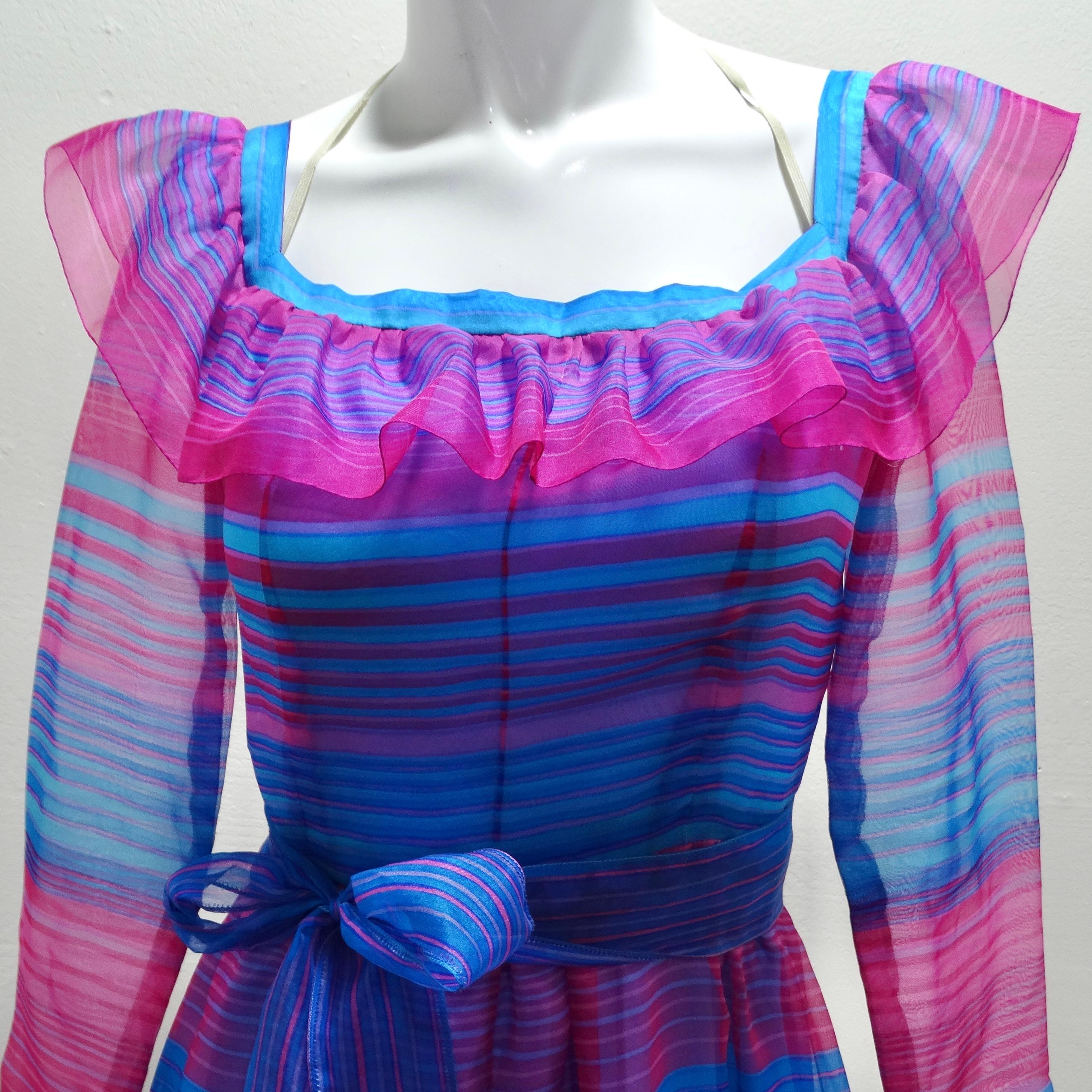 Tauchen Sie ein in den Glamour der 1980er Jahre mit dem Givenchy 1980s Pink & Blue Stripe Dress, einem lebhaften und verspielten Maxikleid, das die Essenz dieser Ära einfängt. Dieses auffällige Kleid mit seinen kräftigen rosa und blauen Streifen