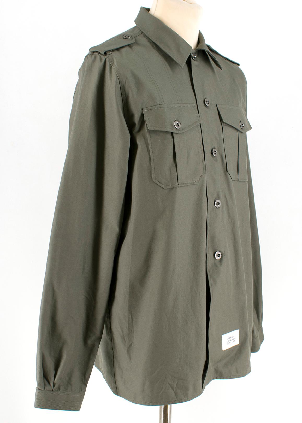 Givenchy Army Green Military Shirt

-Green, 100% cotton
-Long-sleeve
-Button-up
-Collared
-Button-up closure 
-Buttoned sleeves and shoulder detailing 

Please note, these items are pre-owned and may show some signs of storage, even when unworn and