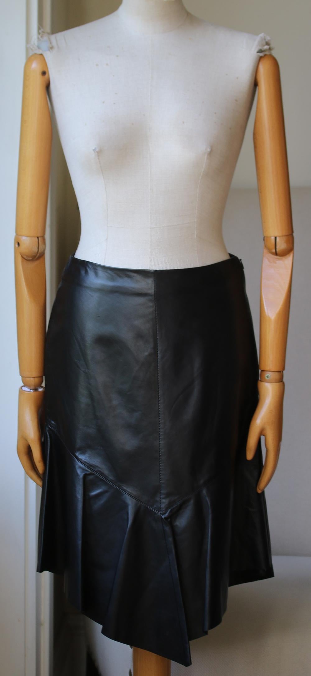 Black lambskin leather peplum skirt from Givenchy featuring a high waist, a concealed fastening and a pleated hem. 100% Lambskin leather. Ling: 60% acetate, 40% viscose. Colour: black.

Size: FR 38 (UK 10, US 6, IT 42)

Condition: As new condition,