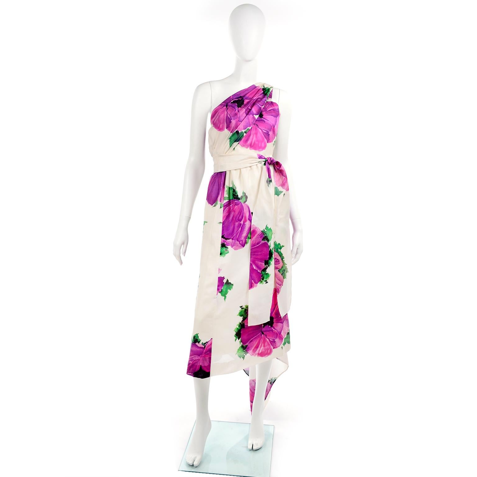 Givenchy Haute Couture Vintage Purple Pink Floral Silk Dress. This is an absolutely gorgeous silk gazar couture dress in an oversized poppy floral print. The dress is missing the Givenchy label but was made for the owner by the gifted Givenchy