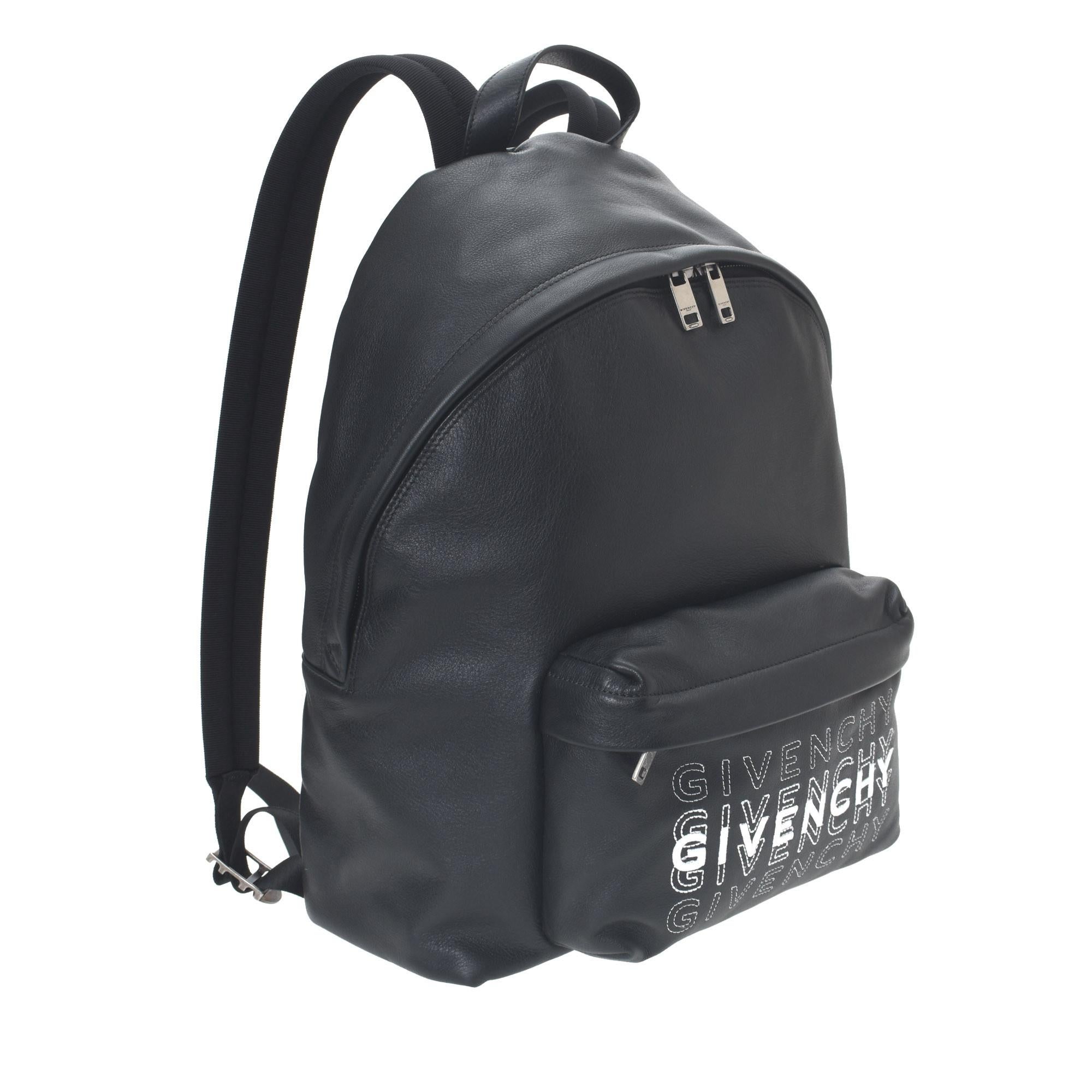 Super functional Givenchy leather logo Backpack in black. Excellent Condition . Guaranteed authentic by LXRandCo. 
