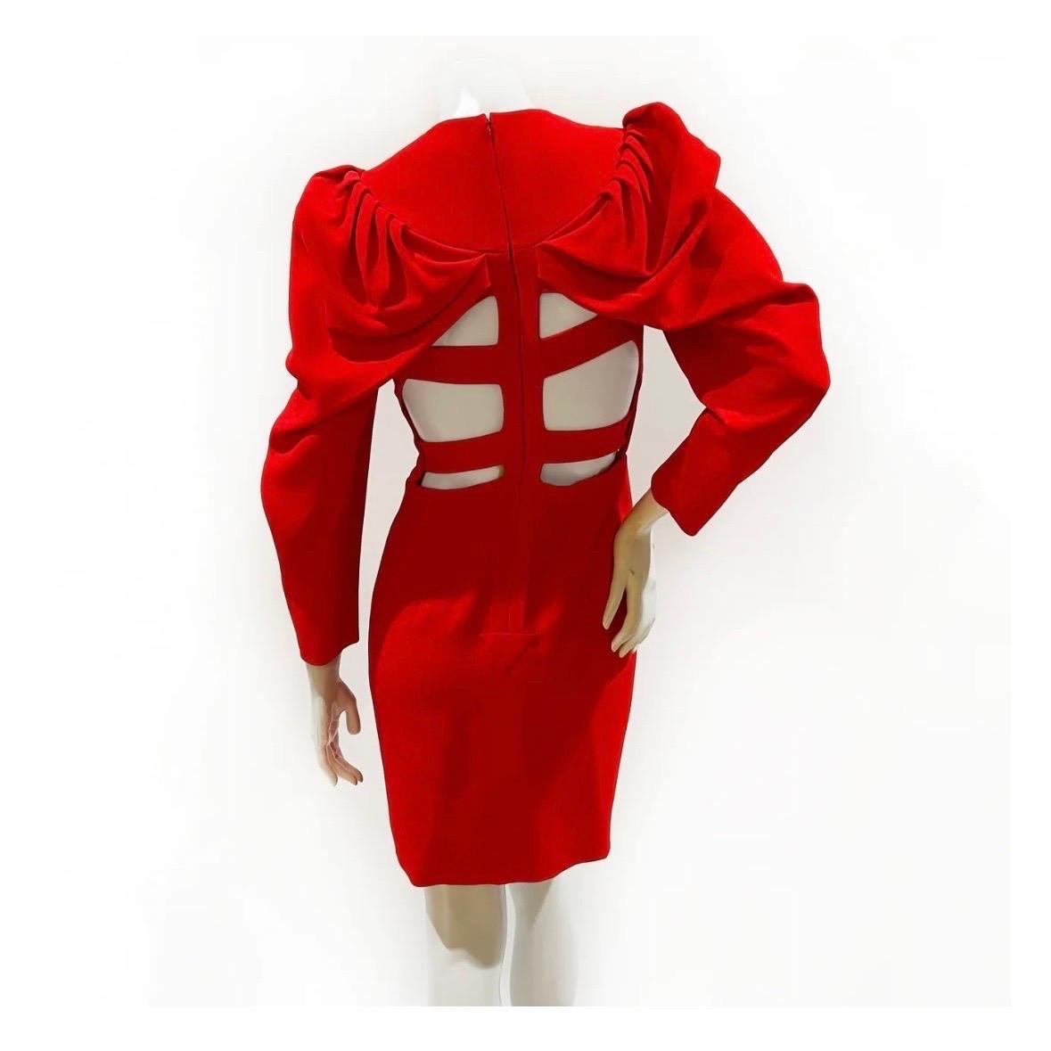Bandage cutout dress by Givenchy
Made in Italy
Red
Three-quarter sleeves
Gathered shoulder detail
Shoulder pads  
Cutouts throughout bodice and back
Decorative overlapping bandage pieces  
Two functional pockets on bust 
Knee-length 
Back zipper