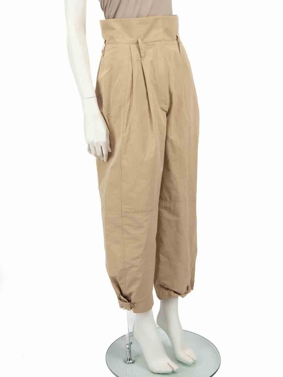 CONDITION is Good. Minor wear to trousers is evident. Light marks to waistband on this used Givenchy designer resale item.
 
 
 
 Details
 
 
 Beige
 
 Polyester
 
 Trousers
 
 Tapered leg
 
 High waisted
 
 Pleated detail
 
 2x Side pockets
 
 Fly