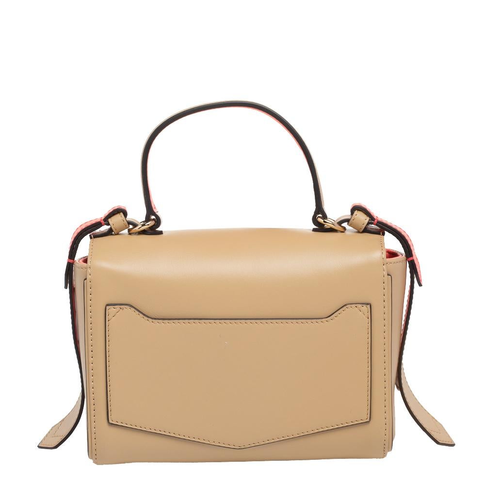 This beautiful Eden bag by Givenchy exudes feminine charm and elegance positively. It is gracefully designed with beige leather, gold-toned fittings, and a top handle that makes it visually attractive. Style this Givenchy bag with your outfit to