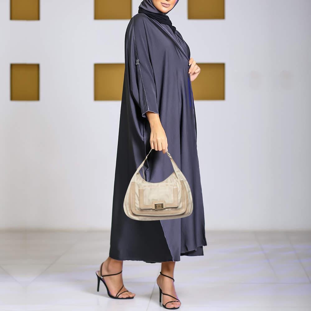 Stylish handbags never fail to make a fashionable impression. Make this designer hobo yours by pairing it with your sophisticated workwear as well as chic casual looks.