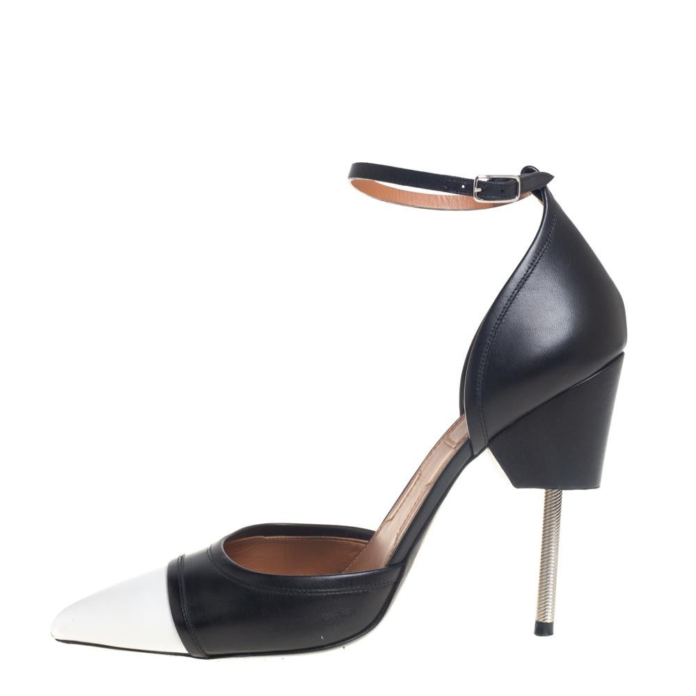 Jazz up your look by flaunting these black and white pumps crafted from leather. The pumps by Givenchy highlight a screw heel and make way for being practical with the contrast pointed toe cap and an ankle strap that has a silver-tone buckle.

