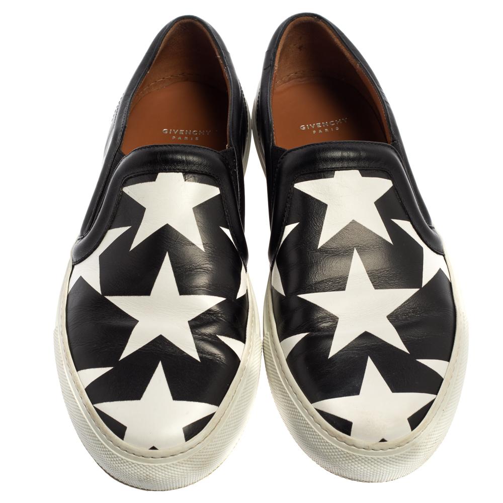Have heads turn your way when you wear these stylish slip-on sneakers from Givenchy. They have been crafted from star-printed leather in classic white & black hues. They have round toes, logo detailing at the counters and tough rubber soles.

