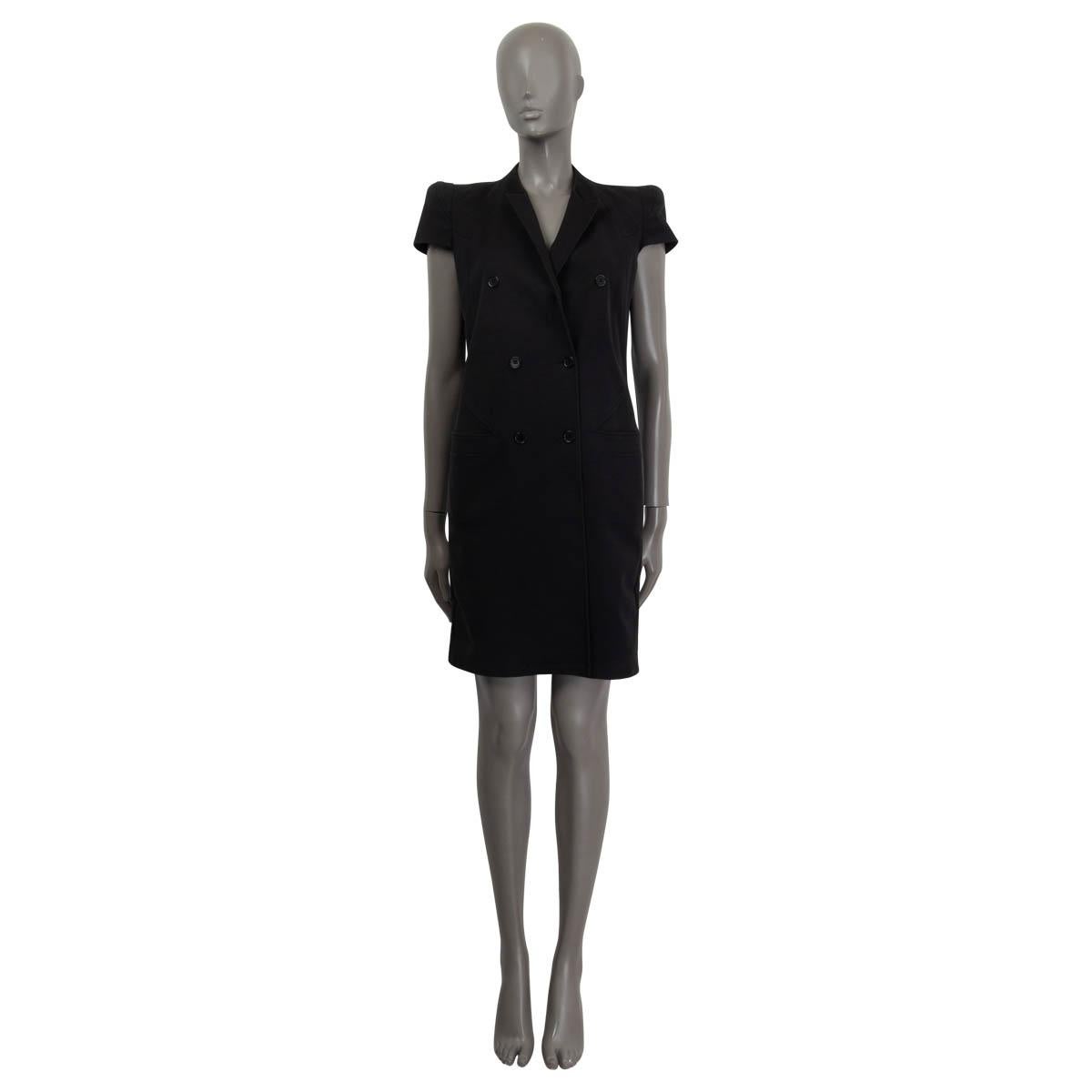 100% authentic Givenchy double breasted short sleeve dress in black cotton (97%) and elastane (3%). Features padded shoulders and two slit pockets on the front. Opens with two black buttons on the front. Lined in black acetate (65%) and polyamide