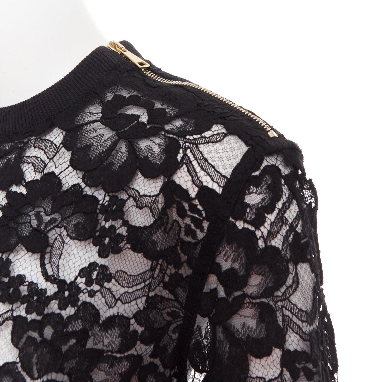 GIVENCHY black cotton lace gold zip pullover sweater FR40 L
Reference: GEGG/A00153
Brand: Givenchy
Designer: Riccardo Tisci
Material: Cotton, Blend
Color: Black, Gold
Pattern: Lace
Closure: Zip
Extra Details: The Givenchy sweatshirt is a black