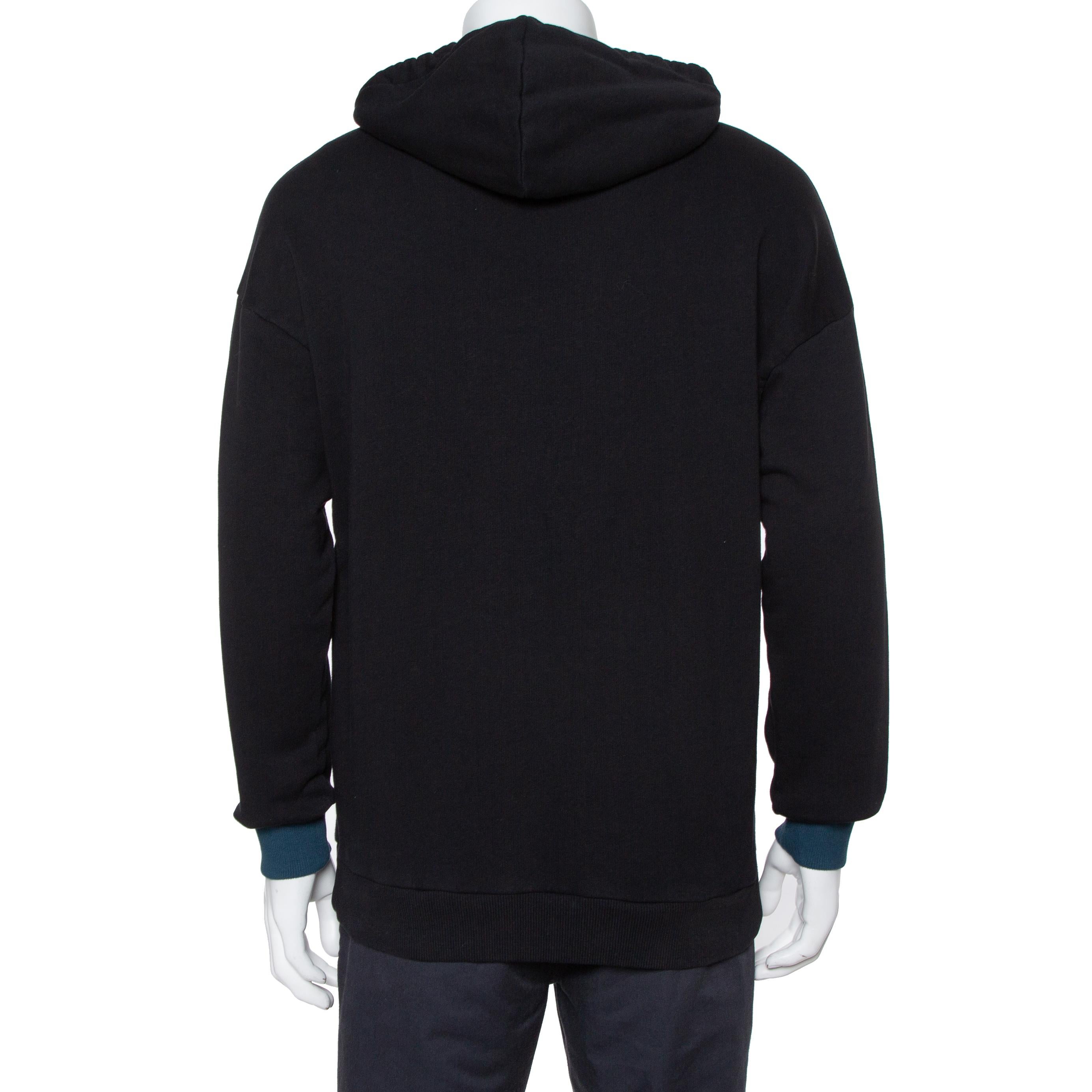 This hooded sweatshirt from Givenchy is perfect for your casual wear. It is made from quality cotton to give you comfort and designed with contrast cuffs on the long sleeves and the brand name embroidered on the front. This creation definitely