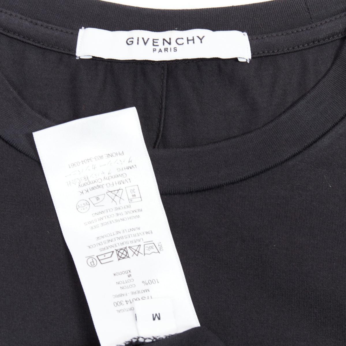 GIVENCHY - T-shirt à manches courtes ajustées en coton noir à imprimé texturé étoilé S en vente 3