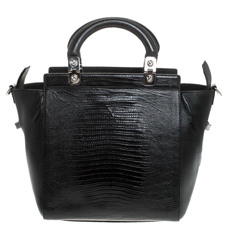 Famous for its excellent designs, this satchel from Givenchy is just what you need. This wonderful croc-embossed leather bag is held bu dual handles and a shoulder strap. The suede lined interior is spacious and will hold all your daily