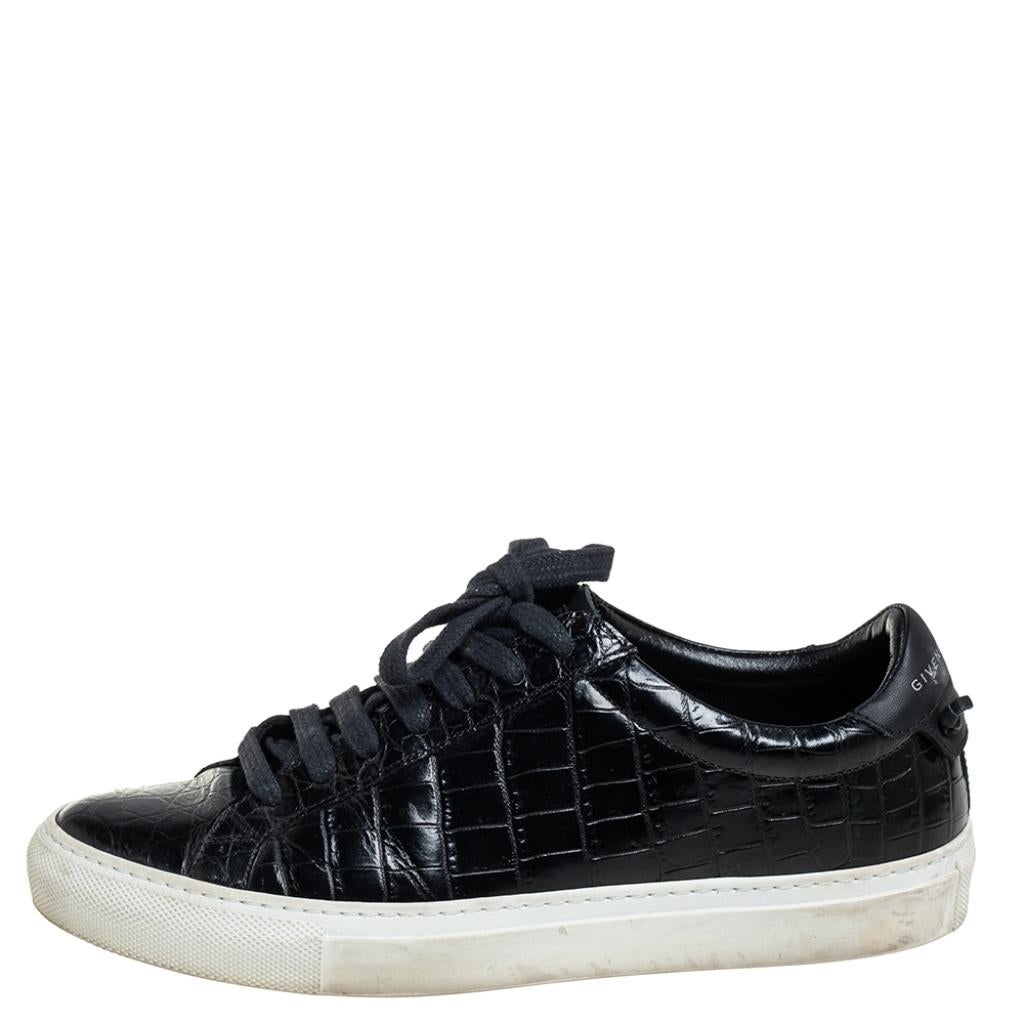 Look in tune with fashion when you wear these black sneakers on a casual day out. This pair from Givenchy is made from croc-embossed leather and detailed with knots and the brand logo on the counters. The vamps are laced perfectly and the insoles