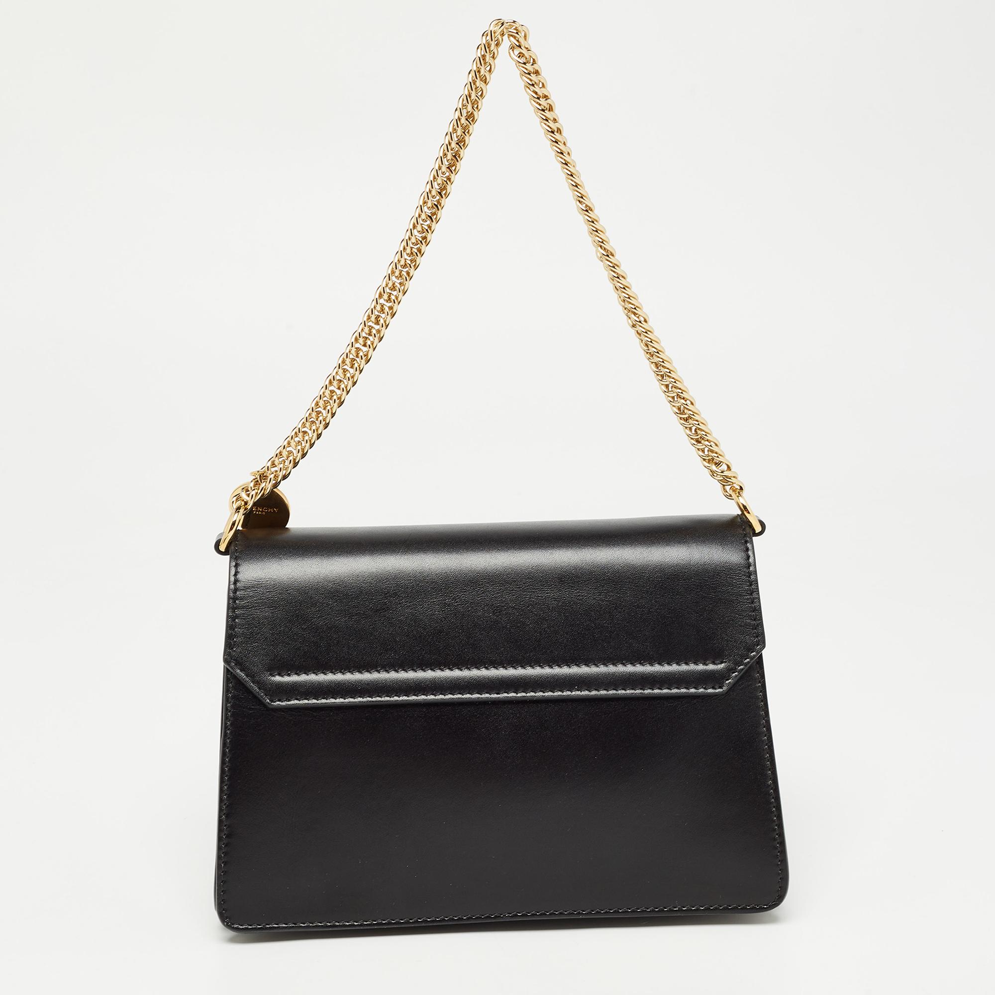 Get style and carry your essentials with ease using this Givenchy black shoulder bag. It has been crafted using high-quality materials to be a standout accessory.

Includes: Info Booklet, Detachable Strap

