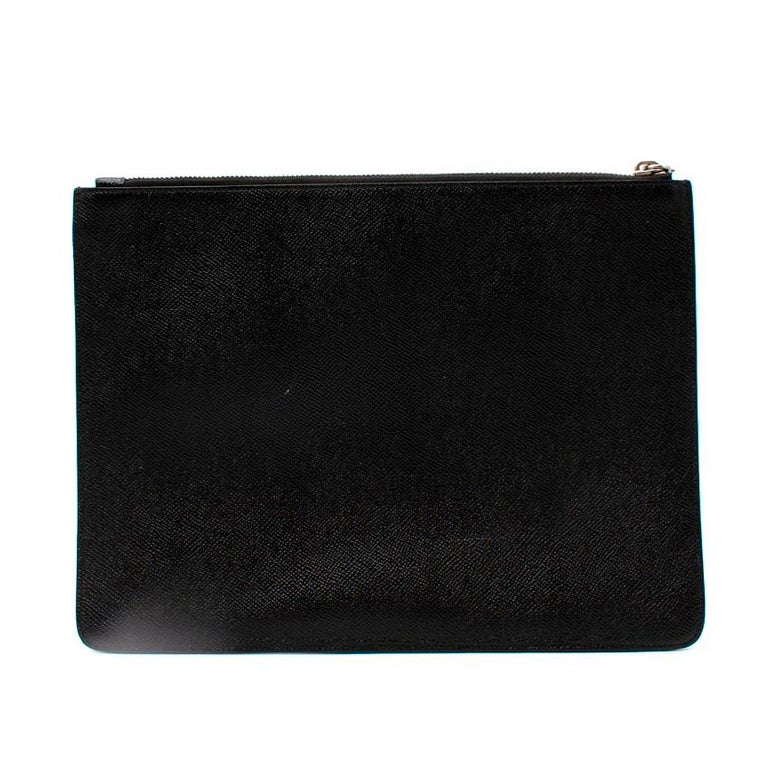 Givenchy - Pochette à imprimé étoilé en cuir Grainé noir En vente sur  1stDibs