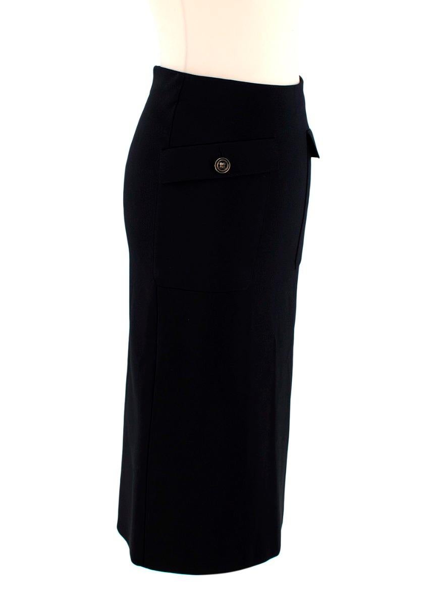 Givenchy Black High Waisted Pencil Skirt
 

 - High waisted stretchy black pencil skirt
 - Two front flap pockets finished with black and gold-tone house logo buttons
 - Concealed zip closure at the back
 - Central rear vent
 

 Materials:
 79%