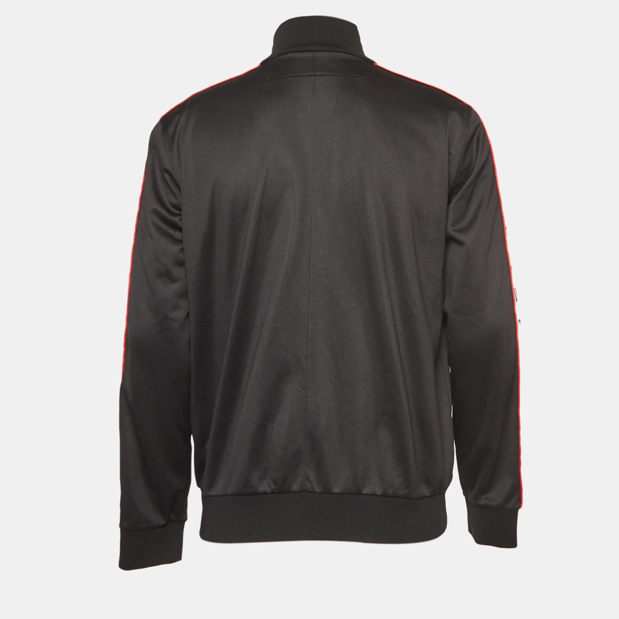 Minimal design and quality come together in this track jacket from Givenchy. Enhanced with logo tape detailing, this black-hued jersey jacket for men is a 'casual style' must-have.

