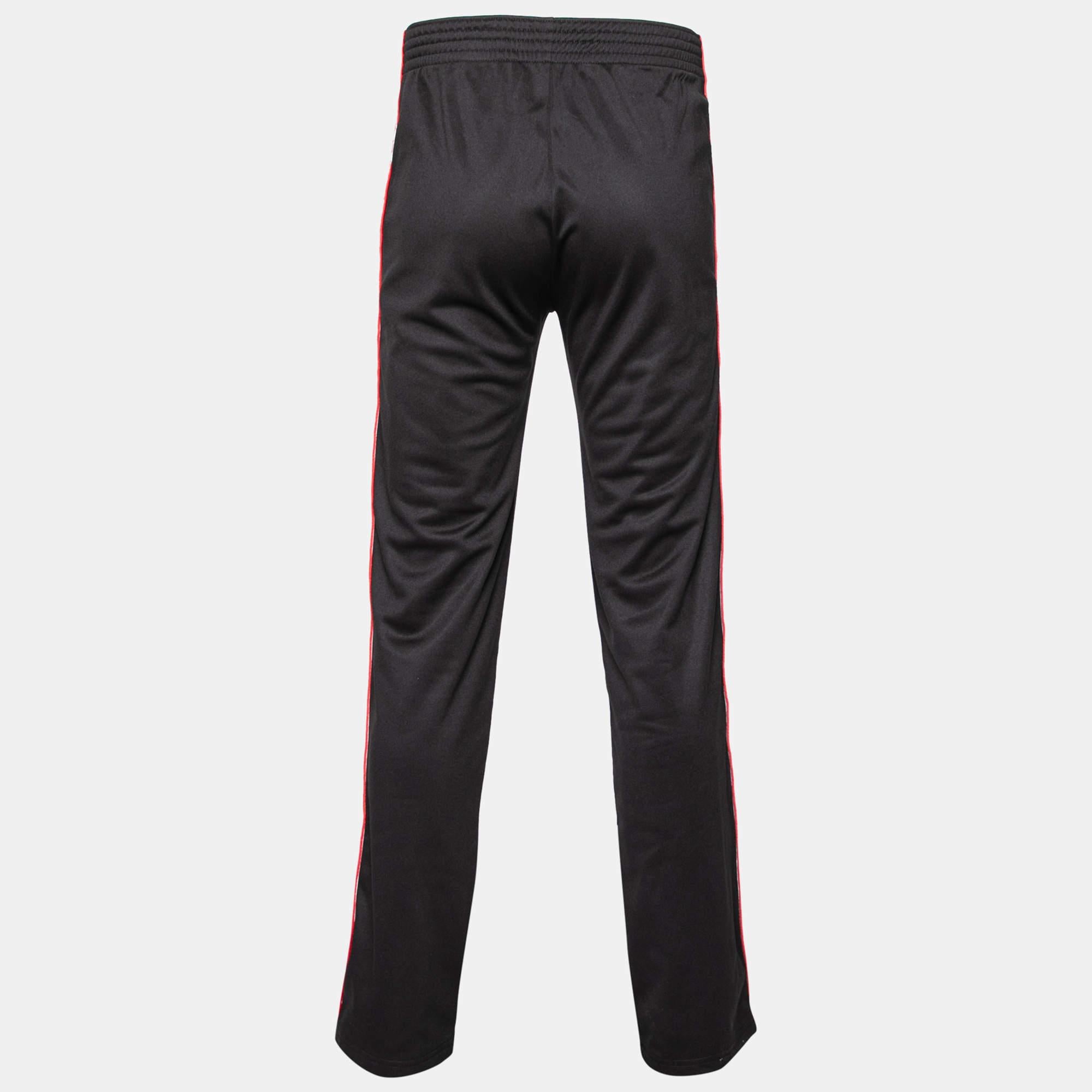 Coming from the house of Givenchy are these super stylish joggers to provide you with the right balance of high fashion and comfort. The black colored pair features logo tape trims along the sides and has been stitched from fine materials. Pair them