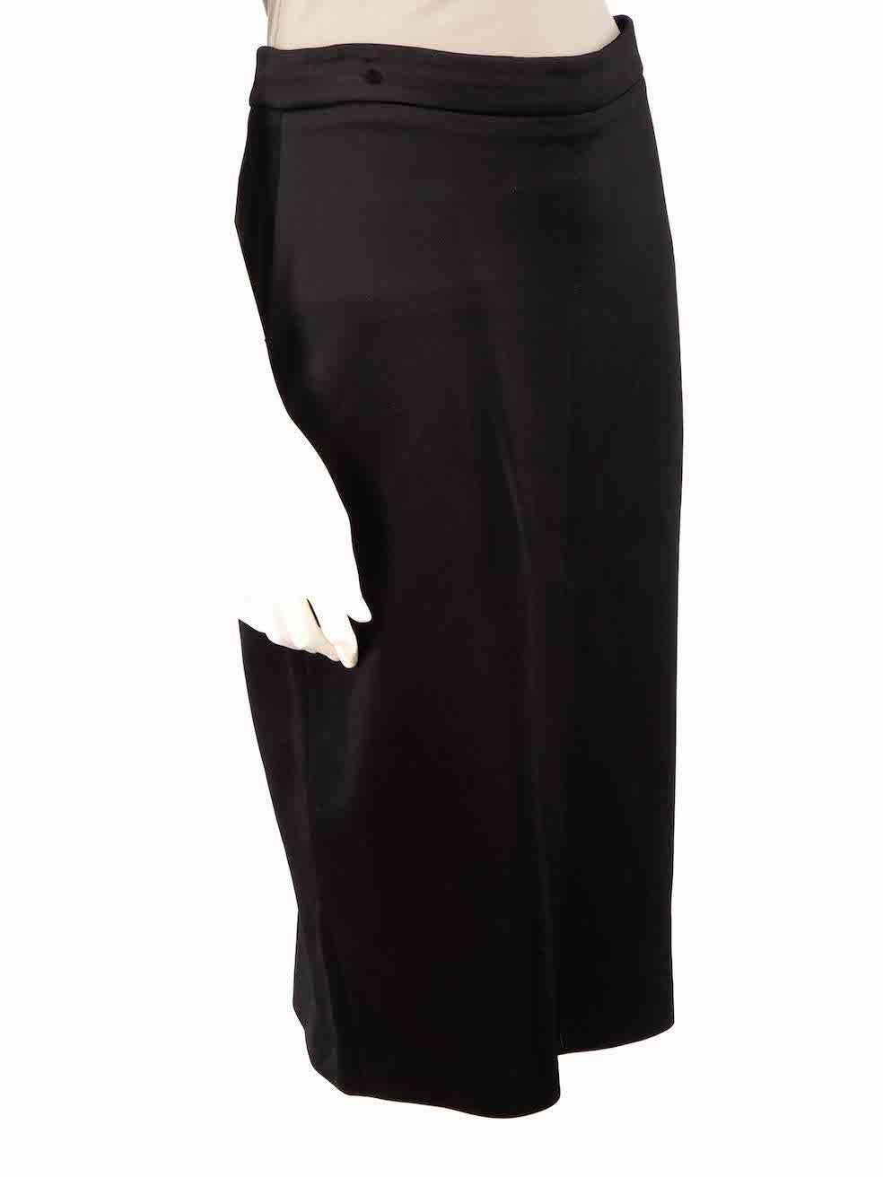 CONDITION is Good. Minor wear to skirt is evident. Light wear to the front and back with plucks to the weave on this used Givenchy designer resale item.
 
 
 
 Details
 
 
 Black
 
 Viscose
 
 Pencil skirt
 
 Knee length
 
 Back sip fastening
 
 
 
