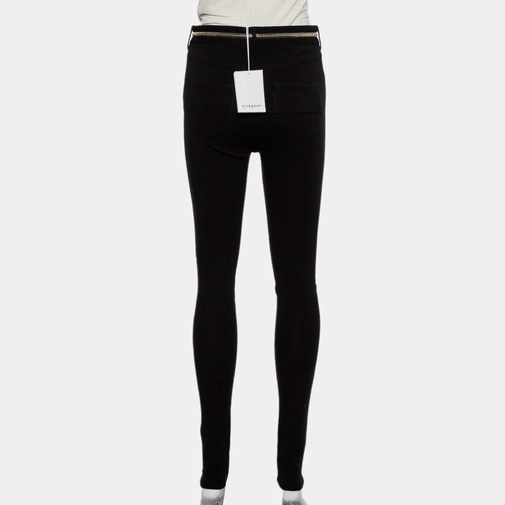 This pair of Givenchy jeggings offer a stylish look and a good fit! Made from a knit fabric, they come in a black shade and detailed with front zip fastening. Wear them with a leather jacket for a chic appeal.

Includes: Brand tag
