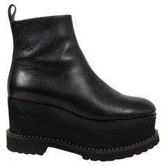 GIVENCHY - Bottines en cuir noir cloutées à plateau « WEDGE », taille 36