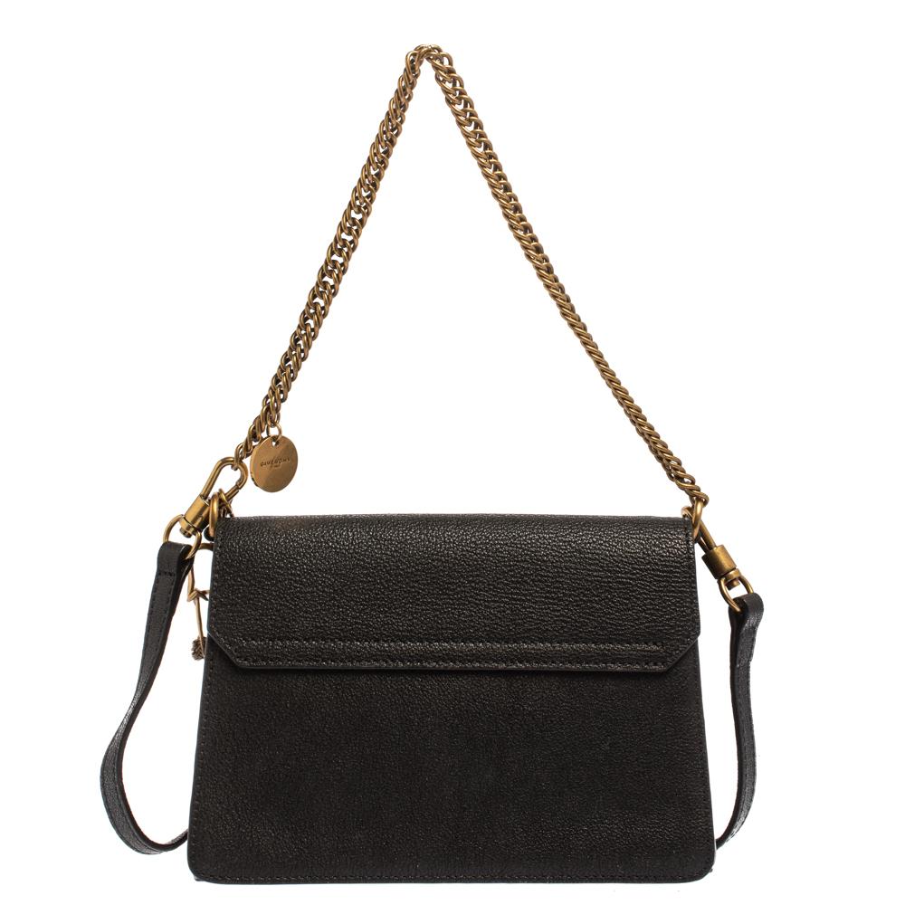 A structured and compact crossbody bag can assist you with many outings and can be styled with most of your attires. This Givenchy GV3 bag is an example of the label’s penchant for creating staple pieces. It is crafted from leather in a black shade