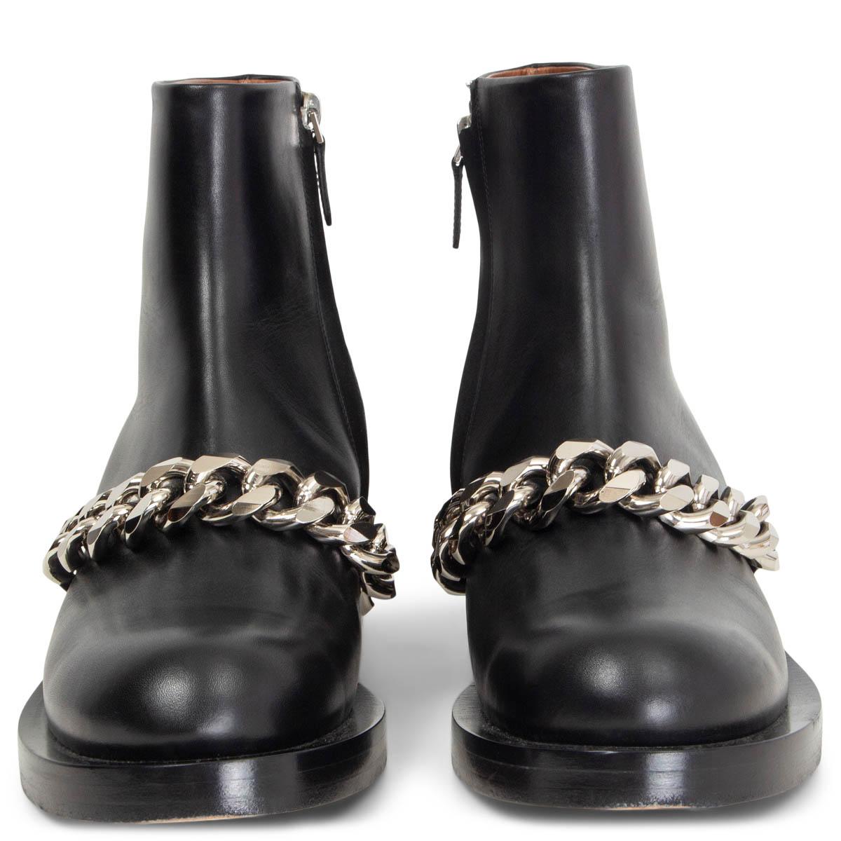 100% authentic Givenchy Laura Chain Strap Ankle Boots in black calfskin featuring a chunky silver-tone chain on the instep. Opens with a zipper on the inside. Have been worn once or twice and are in excellent condition. Come with dust bag.