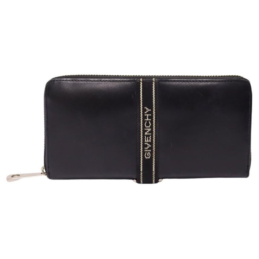 Portefeuille en cuir noir avec logo Givenchy en vente