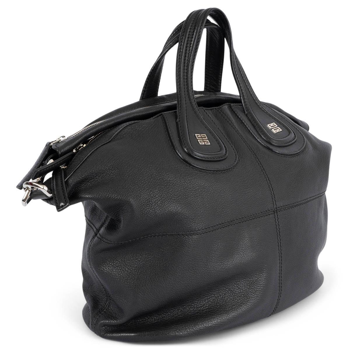 100% authentic Givenchy Nightingale bag in a black goatskin leather featuring dual top handles, detachable shoulder strap with zipper accent detail. Metal logo at bottom of top handles. Opens with a zip closure on top. Lined in black canvas with two