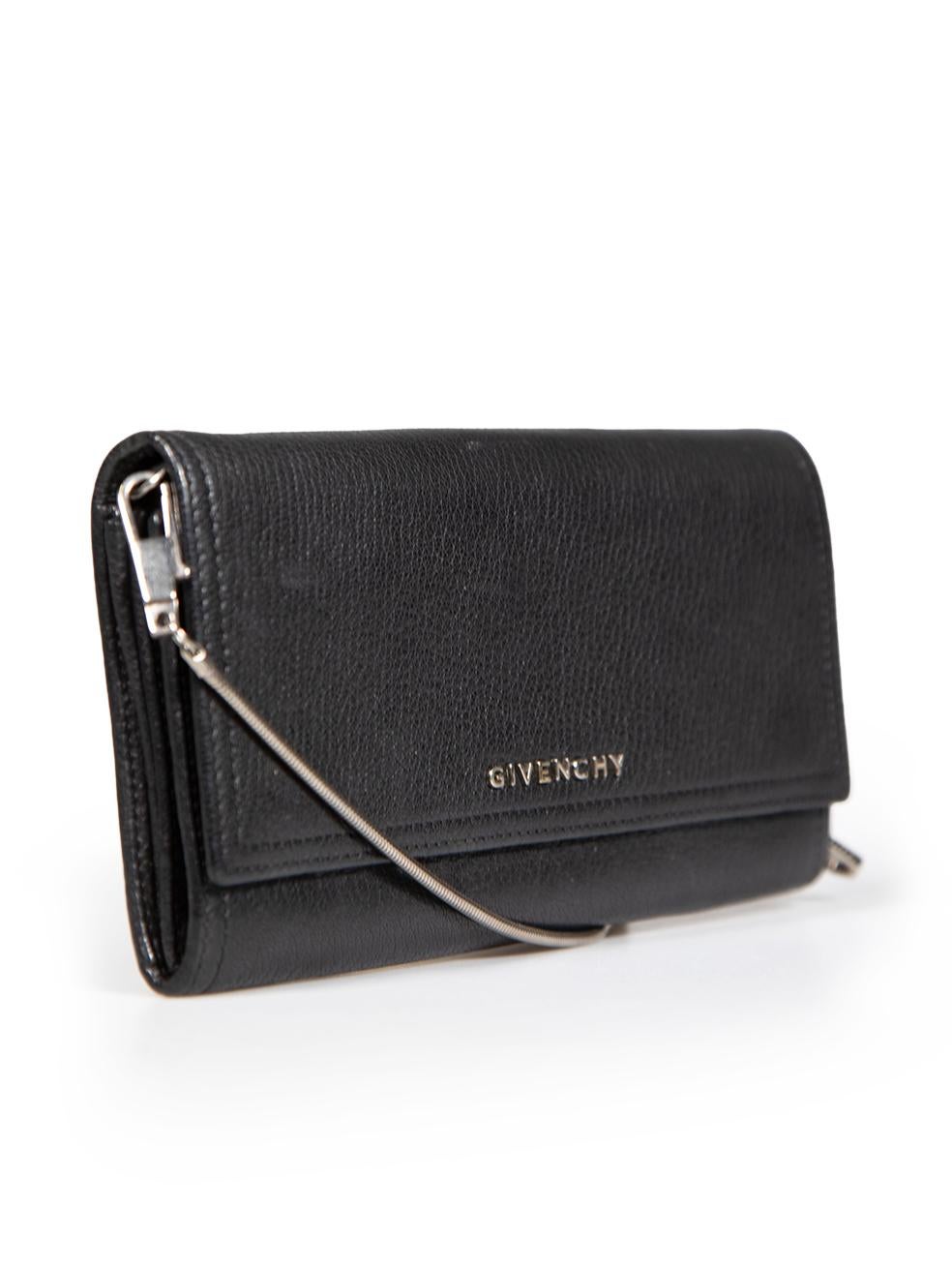 CONDITION is Very good. Minimal wear to bag is evident. Minimal wear to the leather with small abrasion on the front and dents on the internal card holder section and around the snap button fastening on this used Givenchy designer resale item.
 
 
