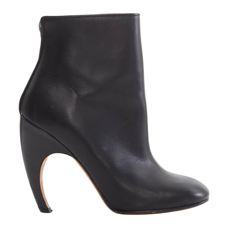 GIVENCHY black leather round toe curved heel zip back heel ankle boot ...