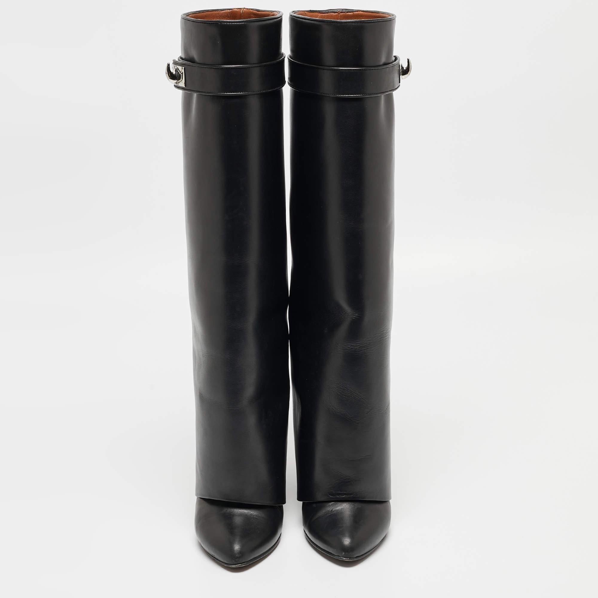 Crafted in a classy black, we love these Givenchy boots. Designed to make a statement, they have a sleek silhouette and a nice fit. Wear yours under maxi skirts for a peek of glamour, or let them shine with cropped hemlines.

Includes: Original Box

